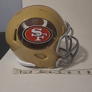 San Francisco 49ers helmet bank gold black red white